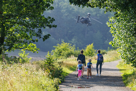 Family enjoy nature trail, helicopter fly above Howden reservoir