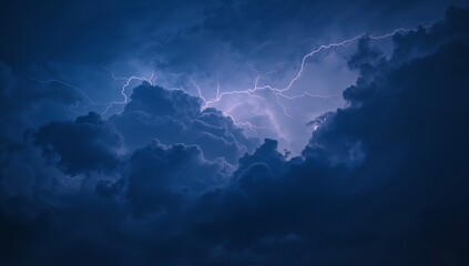 Illuminating dense storm clouds surging across open night sky, with branching lightning patterns