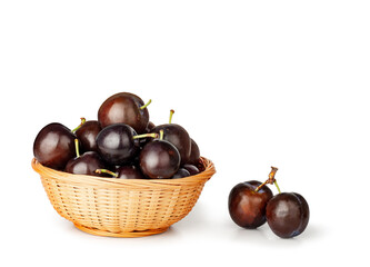 Fresh plums basket isolated on a white background, contour