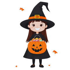 Cheerful kid in witch costume holding pumpkin basket full of candy, ready for Halloween