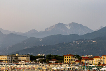 Fototapeta premium Viareggio Italy, panorama of the city and the Mountains. Aerial landscape