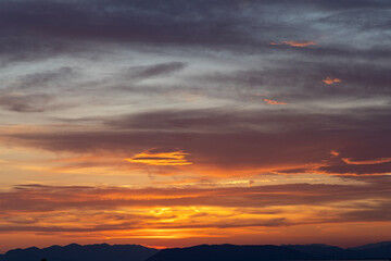 Viareggio, Italy, dramatic sunset with clouds over the Apennine Alps