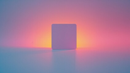 Displaying small square panel standing upright on reflective tabletop, with gradient backdrop