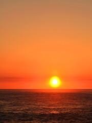 Fototapeta premium Sunset over the Atlantic Ocean in the Camino de Santiago, Galicia.