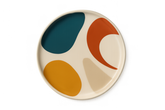 Ceramic plate featuring an abstract pattern with geometric shapes in teal, orange, and mustard yellow. Transparent background