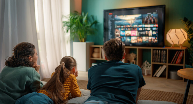 family watching  TV at home