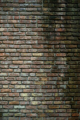 다양한 붉은색 벽돌의 벽 배경 