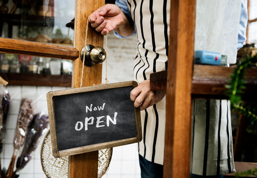 Storefront Opening Sign Displayed Mockup PSD
