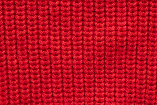 Knitted red background close-up