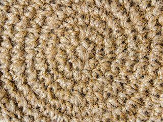 Beautiful circle pattern on a handmade woven basket made of spiral-shaped jute rope