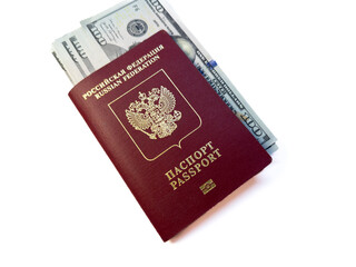 Russian passport and hundred dollar bills. Entry tax to the USA, visa fee, visa tax, deposit of money in the USA upon entry. immigration emigration visa us, visa USA, copy space, flat lay, top view. H
