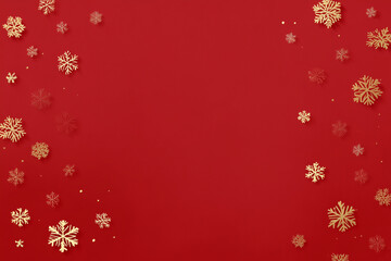 glossy red christmas background with subtle reflections, minimal gold snowflake accents, empty space for text in middle,