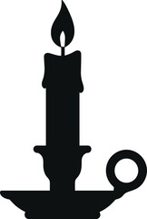 candle burning in a classic holder with soft wax drips silhouette