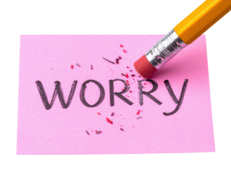 A pencil eraser is removing the word "WORRY" from a pink notepad, symbolizing the act of letting go of worries.
