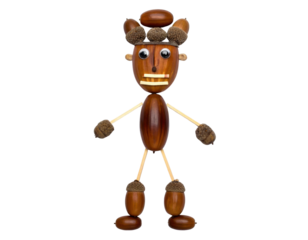 A whimsical figure crafted from various seeds and sticks, designed to resemble a person with distinct facial features and limbs.