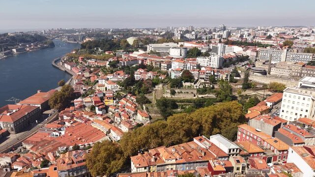 Aerial View of Porto, Portugal. Hospitals, Virtudes Park and Buildings on Hills Above River