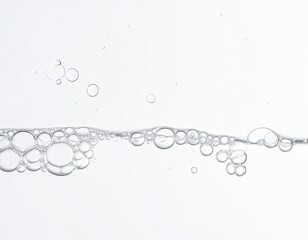 Water line with bubbles; clear, bright, and minimal