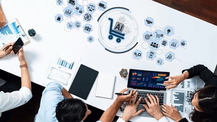 A dynamic business environment showcasing a diverse team discussing artificial intelligence and e-commerce strategies using charts and data on a laptop. Raster