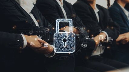 A business team in suits focuses on a digital security concept during a meeting. The overlay of a lock symbolizes the importance of protecting information and data. Raster