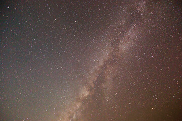 A clear night sky reveals the spectacular band of our own galaxy.