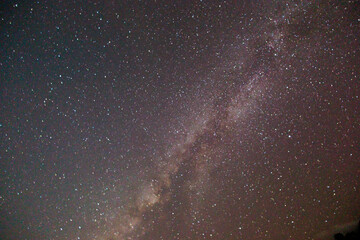 A clear night sky reveals the spectacular band of our own galaxy.