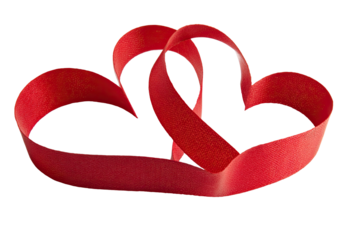 Two red ribbon hearts intertwined on a plain background