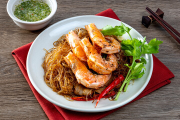 Baked shrimp with glass noodles in a plate