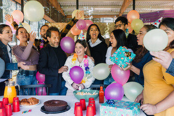 group of latin people family celebrating birthday party at terrace outdoors in Mexico Latin...