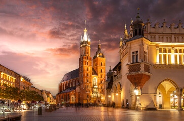 St Mary's Basilica (Mariacki Church) in the Old Town of Krakow (Cracow), Poland. Illuminated on The Main Market Square at night after sunset