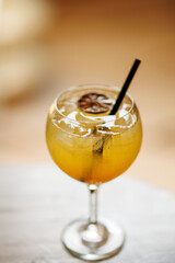 Refreshing orange cocktail with dried citrus and ice