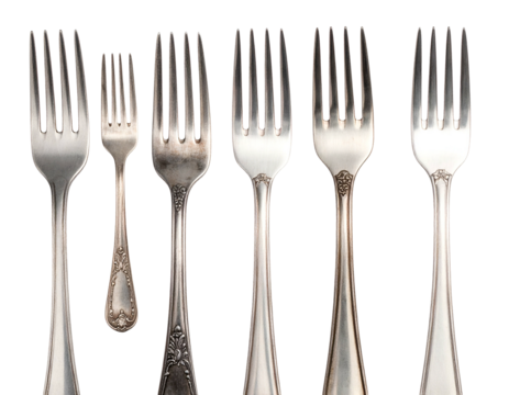 Silverware forks arranged in a row on a white background.