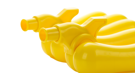 BABY TOYS - Close-up of bright yellow balloon pumps in a row on white background, perfect for party decorations and event setups