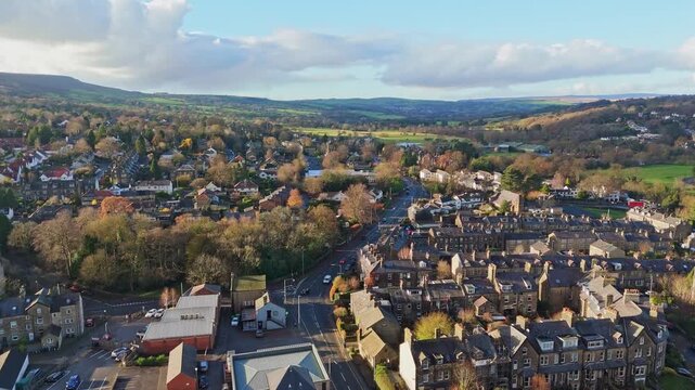 Aerial landscape views of the Ilkley moors and Ilkley spa town located  in the City of Bradford in West Yorkshire, in Northern England. Explored by drone POV.