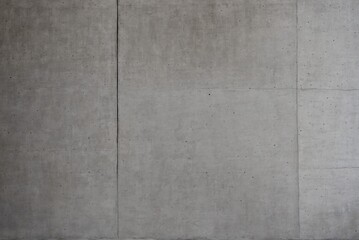 Fototapeta premium Smooth Concrete Wall Surface – Modern Minimalist Grey Texture for Backgrounds and Architecture Mockups