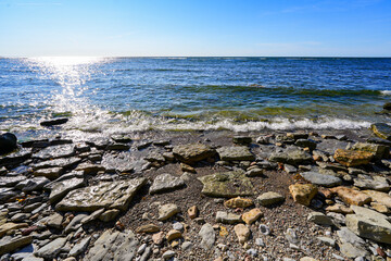 Pebbly beach at the foot of the Panga Cliffs on the north coast of the Estonian island of Saaremaa...
