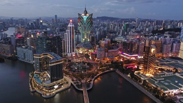 Aerial view of downtown skyline at night, Macao, China