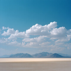Horizon Hues A Tranquil Desert Vista Under a Majestic Sky, with Mountains Fading into the Distance