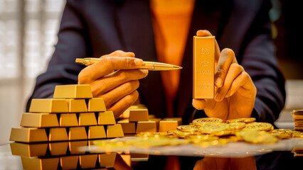 A suited Asian analyst confirms the tangible value of global gold holdings, carefully placing a...