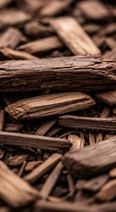 Fototapeta premium Wood chip texture background. Natural cover material for garden bed and backyard landscaping. Organic mulch for plant and tree maintenance.