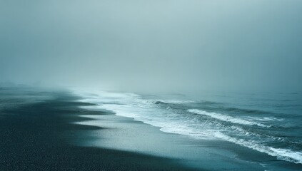 Misty beach scene at dawn or dusk