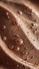 Close-up of smooth chocolate mousse texture with delicate air bubbles.