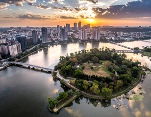 Fototapeta premium Panoramic sunset view of a city with a lake and island park