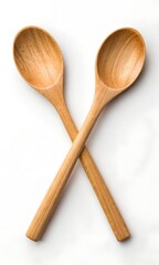Two wooden spoons, one shallow, one rounded, crossed, on white background