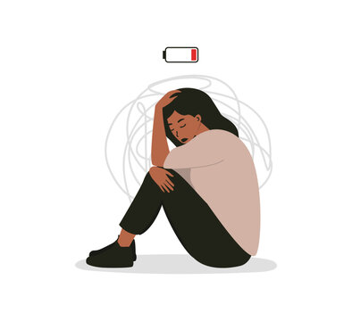 A sad woman sitting with her knees drawn up and holding her head. Behind her are chaotic lines symbolizing emotional turbulence, and above is a low battery icon. Burnout, stress, and social fatigue.