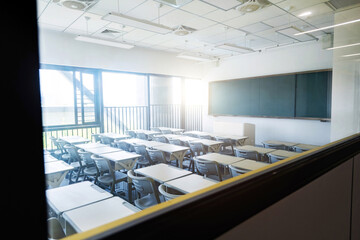 Looking at the classroom through the window