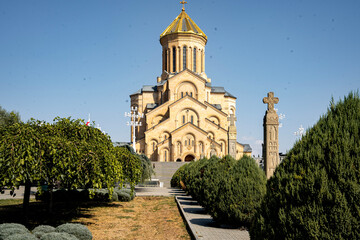 Holy Trinity Cathedral Of Tbilisi In Georgia: Majestic Golden Domed Orthodox Church Under Clear...