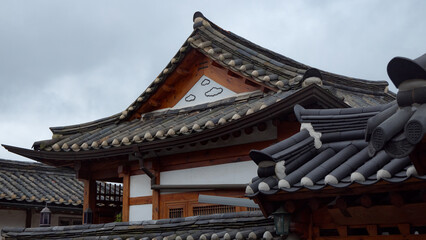 Fototapeta premium Traditional Korean hanok roofs showcasing historic architecture in an ancient village