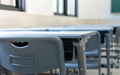Tables and chairs in the school classroom