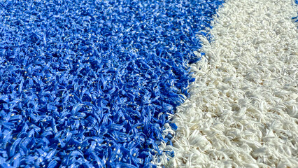 Vivid oceanic blue and ivory textures mimic frothy marine waves, evoking World Oceans Day and artistic abstraction