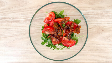 Arugula and sun-dried tomato medley dazzles with verdant freshness, reminiscent of midsummer feasts and the Italian Sagra delle Erbe